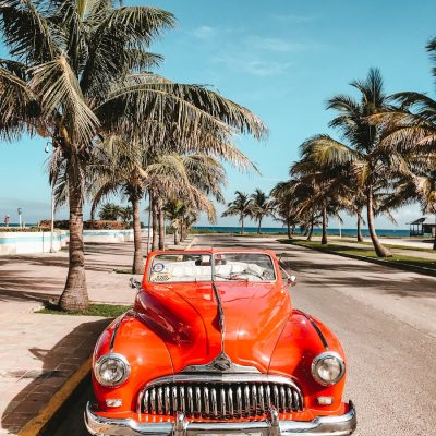 orange car on asphalt road